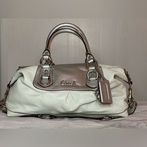 White and silver coach bag.